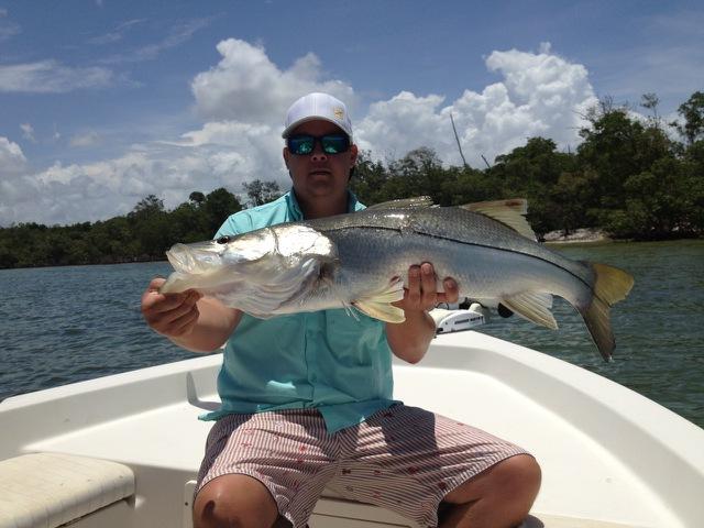 Matt Geroy with a bruiser snook caught and released with his brother Capt. Ben Geroy