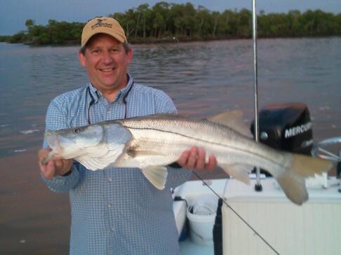 Ron Petnuch with another large snook caught and released last week with Capt. Todd Geroy