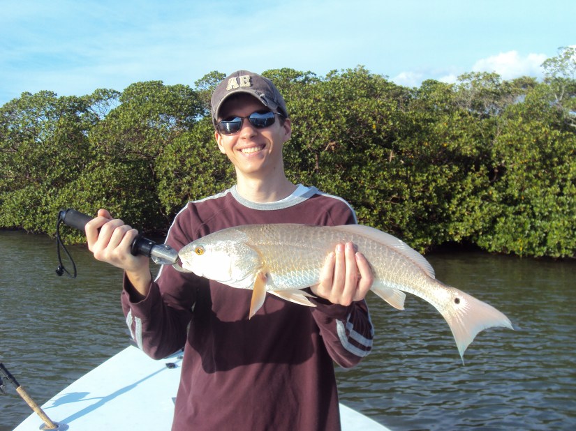 Jarad Dugan with a typical December redfish caught last week