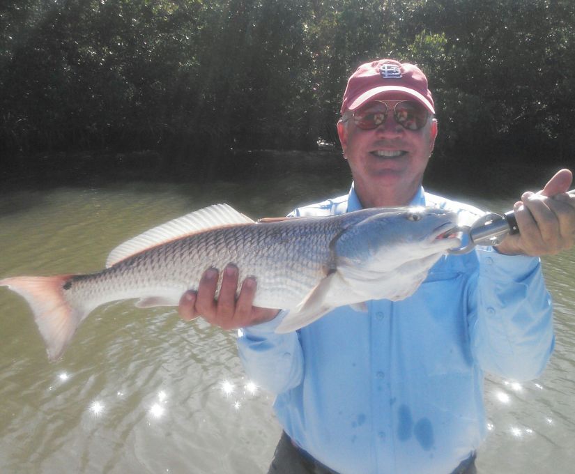 Angler Bob Messey with a nice 26 1/2 inch New Years redfish!