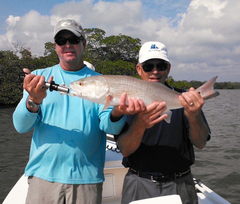 Capt. Todd and angler Jim Chisholm released this over slot redfish Thursday afternoon. 
