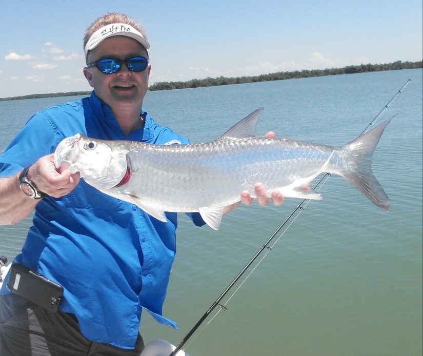 Ted with a bright baby tarpon