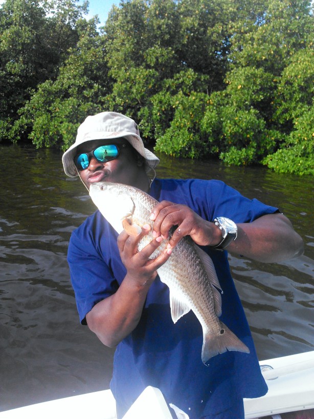 Sgt. Lindon with one of his many redfish! This guy loves fishing! 